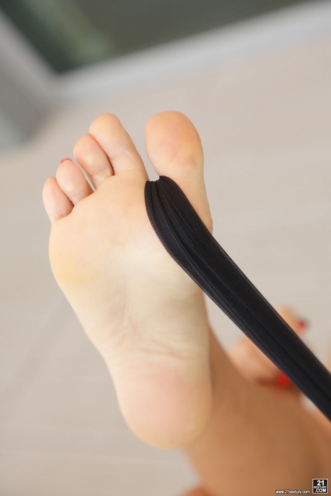 Black Lingerie and Foot Fetish Play on a Sunlit Terrace photo 9