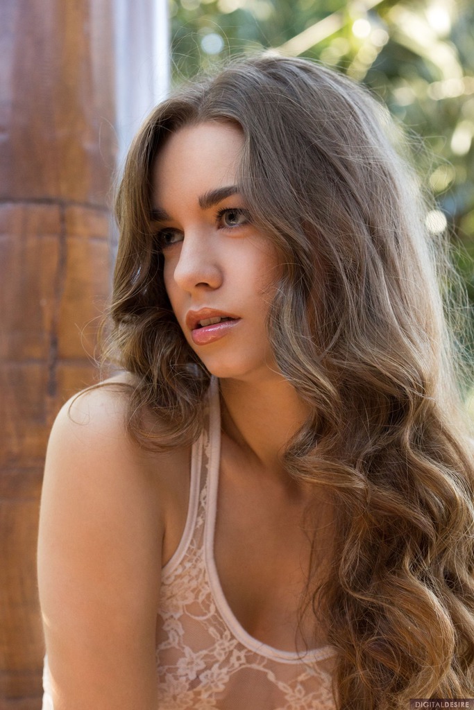 Tali Dova in a Cream Top and Red Skirt Outdoors photo 3