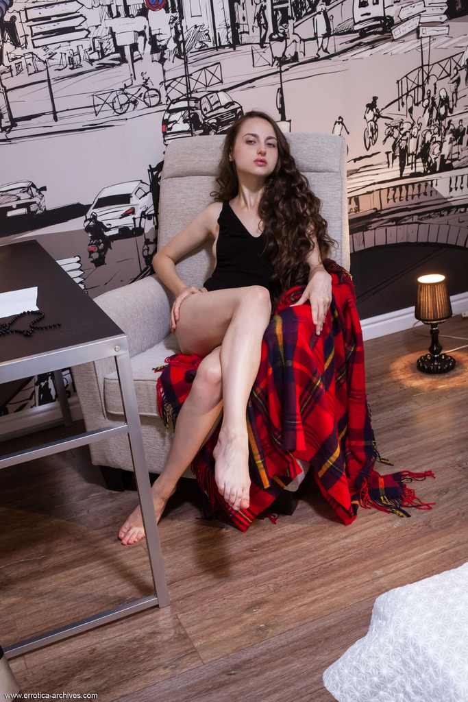 Logan in a Black Robe and Red Chair photo 2