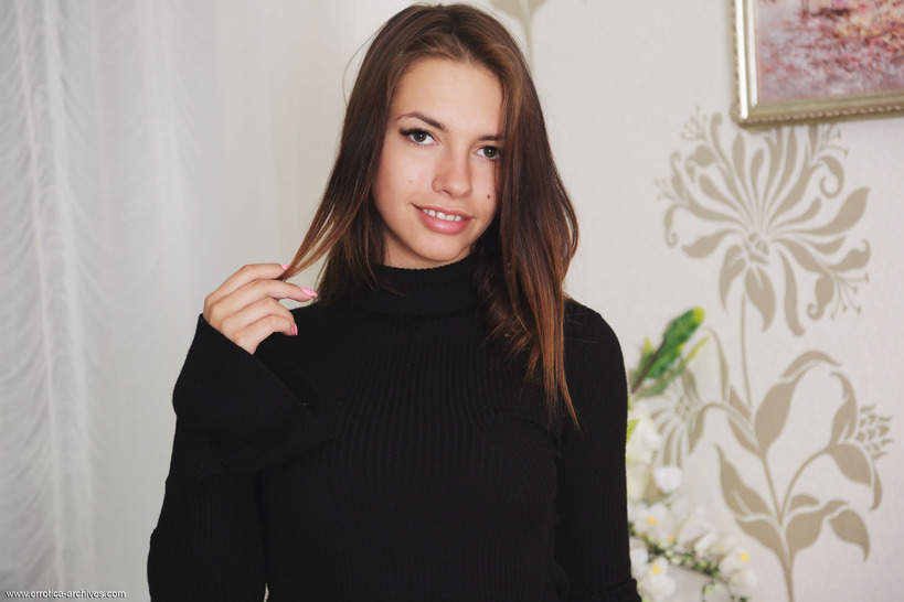 Black Knit Dress on a Cream Armchair photo 2