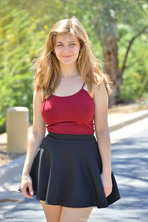 Red Crop Top on a Quiet Sunlit Road - photo 2