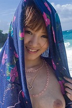 Horny Asian Girl Misako posing on the beach 15