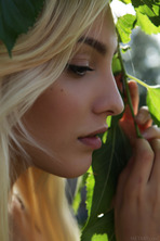  she devours a succulent raspberry between her luscious lips photo 1