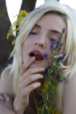  she devours a succulent raspberry between her luscious lips photo 5