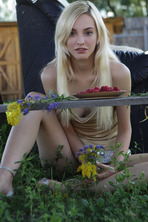  she devours a succulent raspberry between her luscious lips photo 7