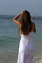 Exotic goddess Elin walks along a deserted beach 01