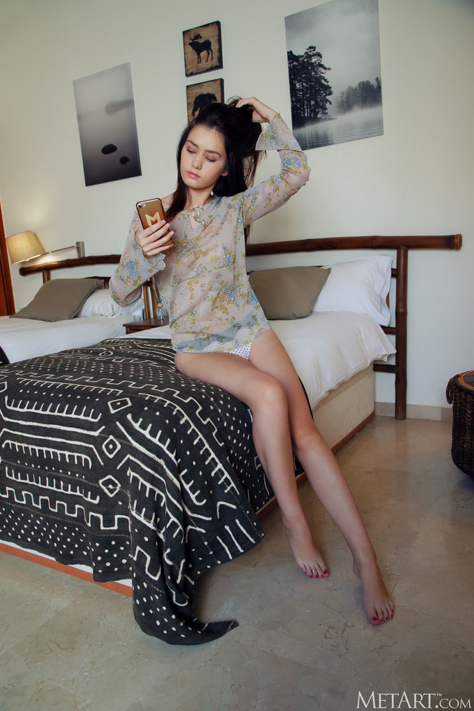 Casual T-Shirt Strip on a Twin Bed photo 1
