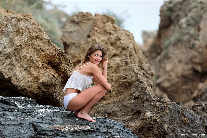 Kaitlin in Floral Swimwear on a Sunny Nerja Beach - photo 9