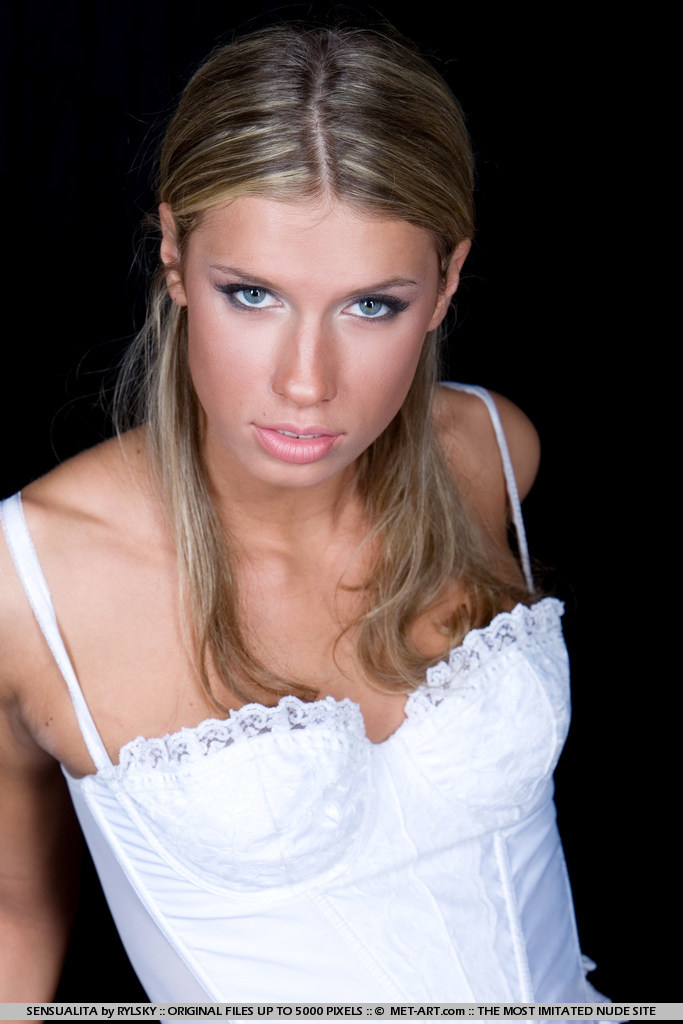 Pavlina Valentova in a Dark Indoor Set photo 4