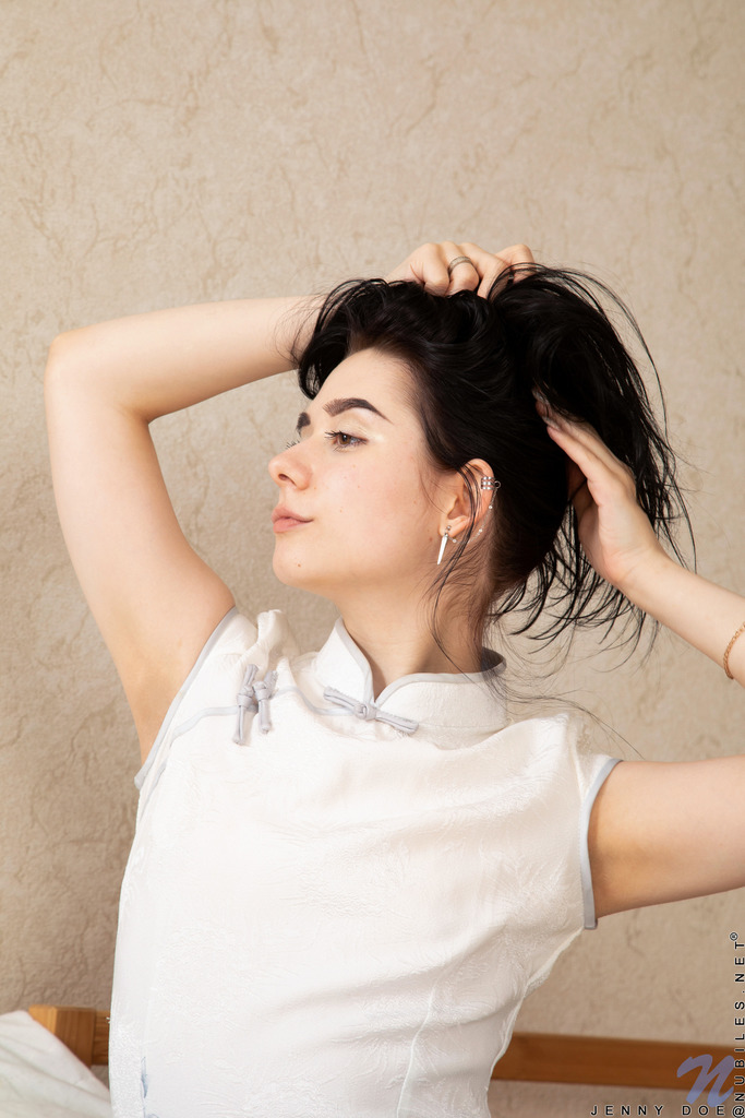 White Crop Top to Nude Self-Touching on Patterned Bedding photo 3