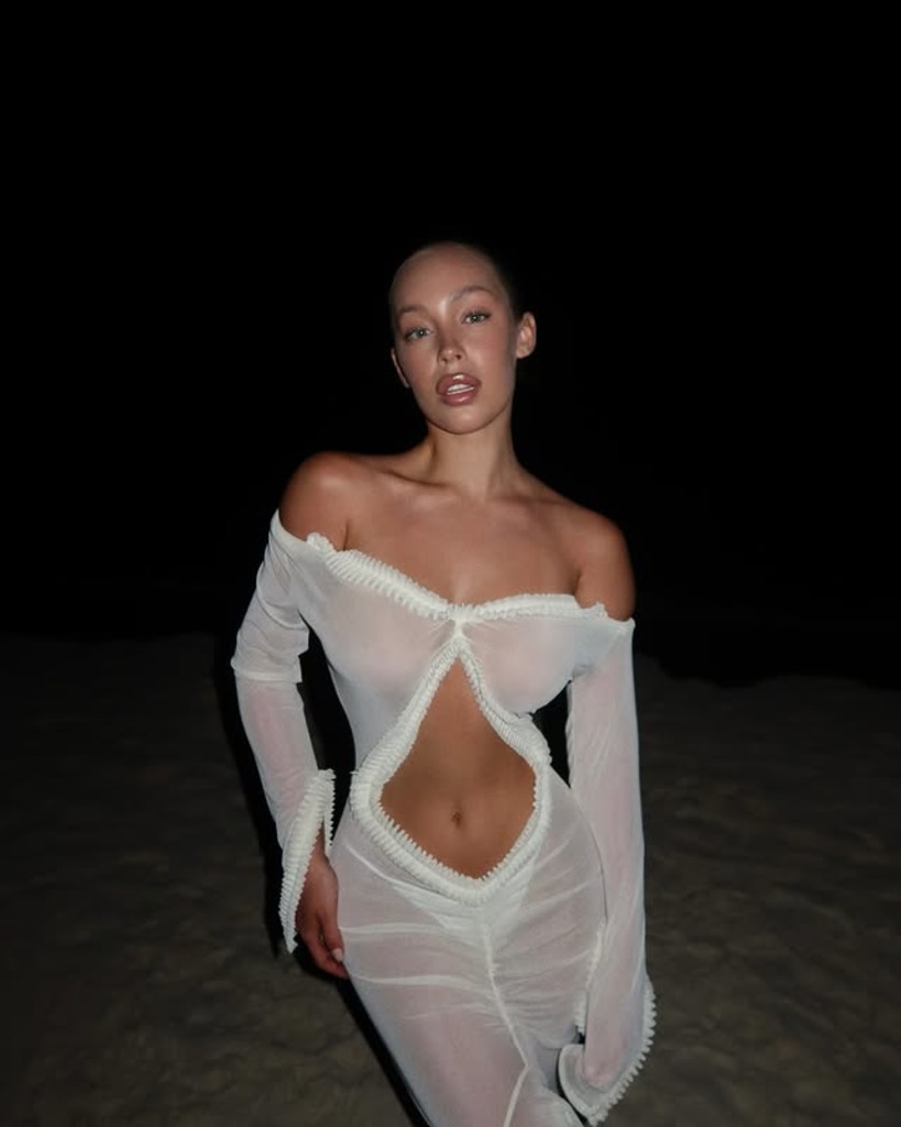 Gogol Marie in Dark Swimwear and a White Robe photo 21