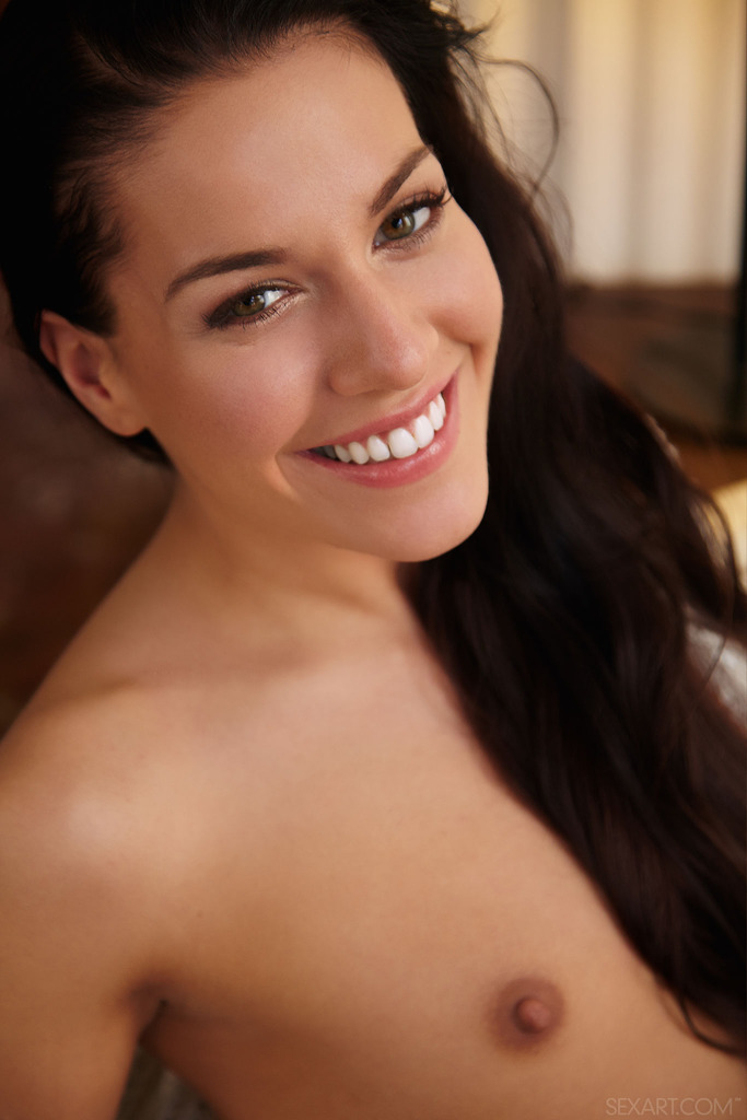 gorgeous long haired brunette smiles photo 10