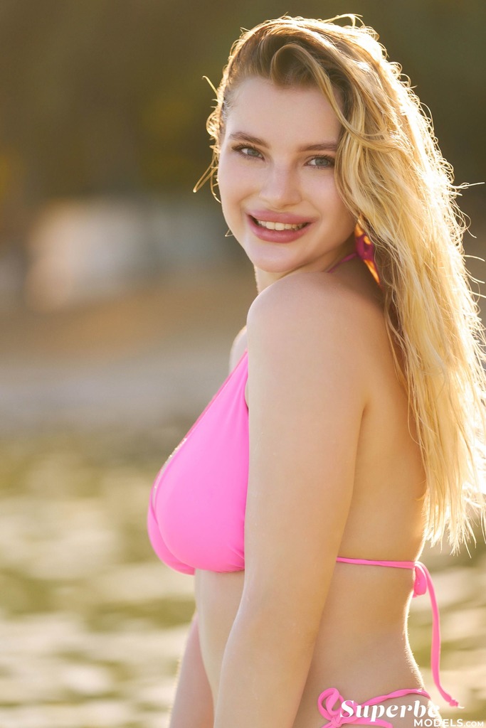 Pink Bikini and Sheer Wrap in a Tropical Outdoor Set photo 7