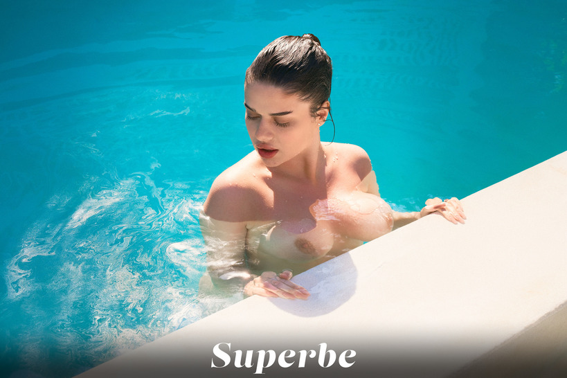 Caribbean Soul in a White Bikini by a Blue Pool photo 12