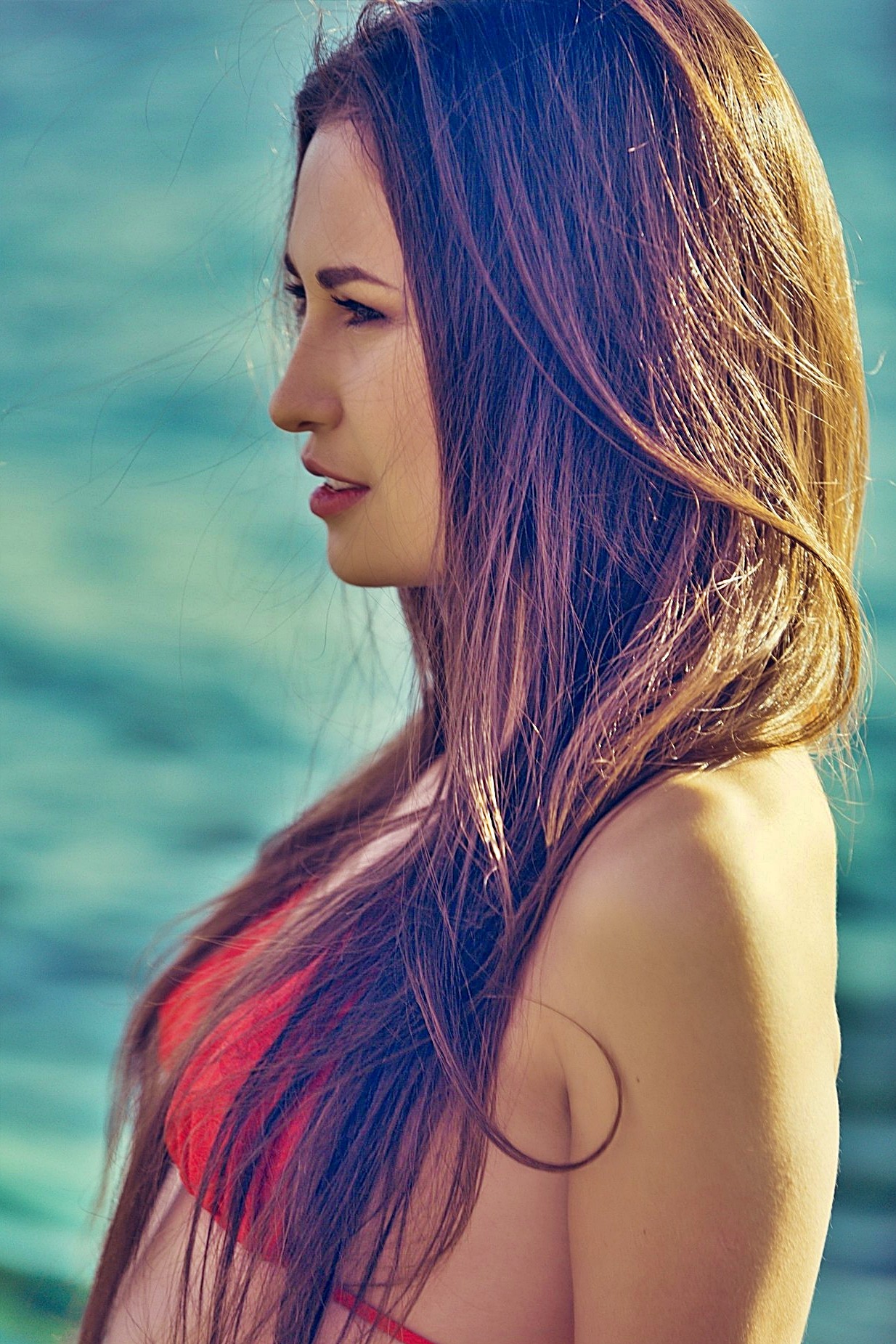 Red Bikini and Nude Poses on a Rocky Shore