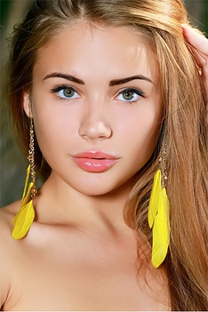 Naughty blonde newcomer Gracia walks barefoot and topless